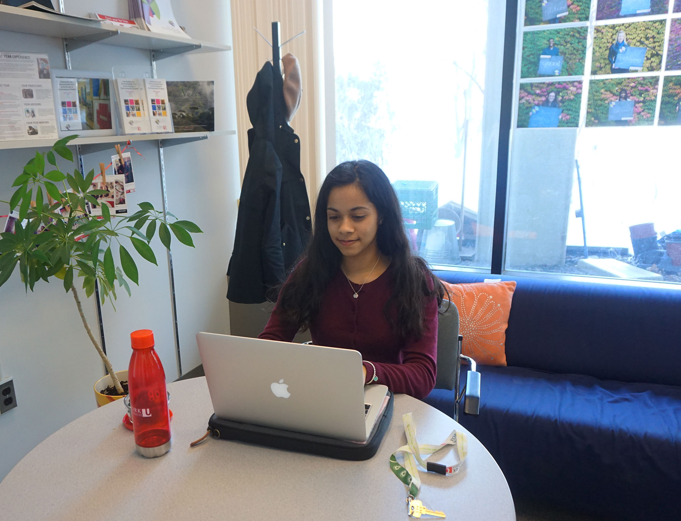 This is a photo of Aliya working for the Faculty of Environmental Studies.