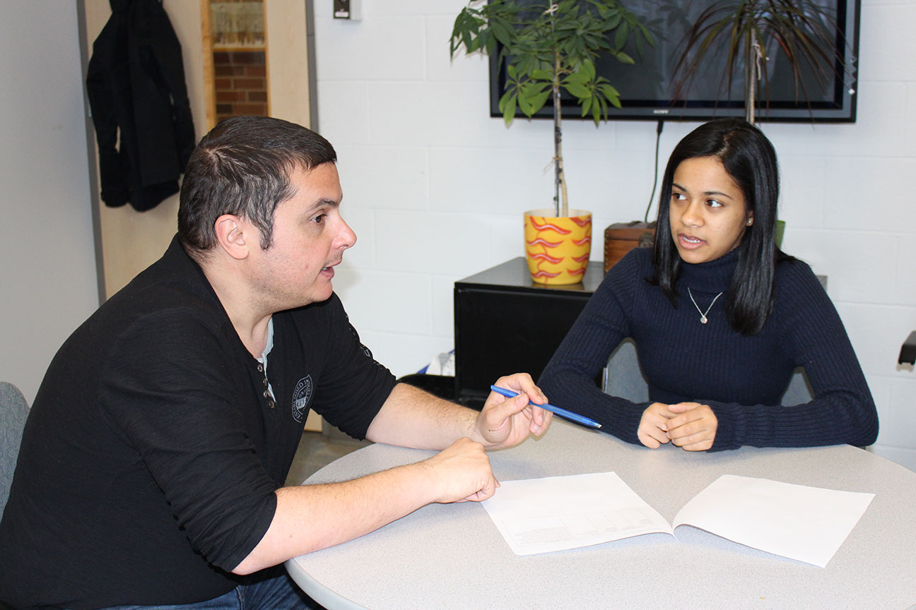 This is a picture of Joseph and Aliya discussing volunteer opportunities.