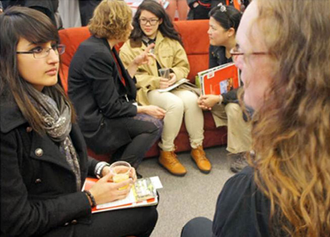 This is a picture of Sanya talking to Gail Fraser at the Spring Open House in 2012.
