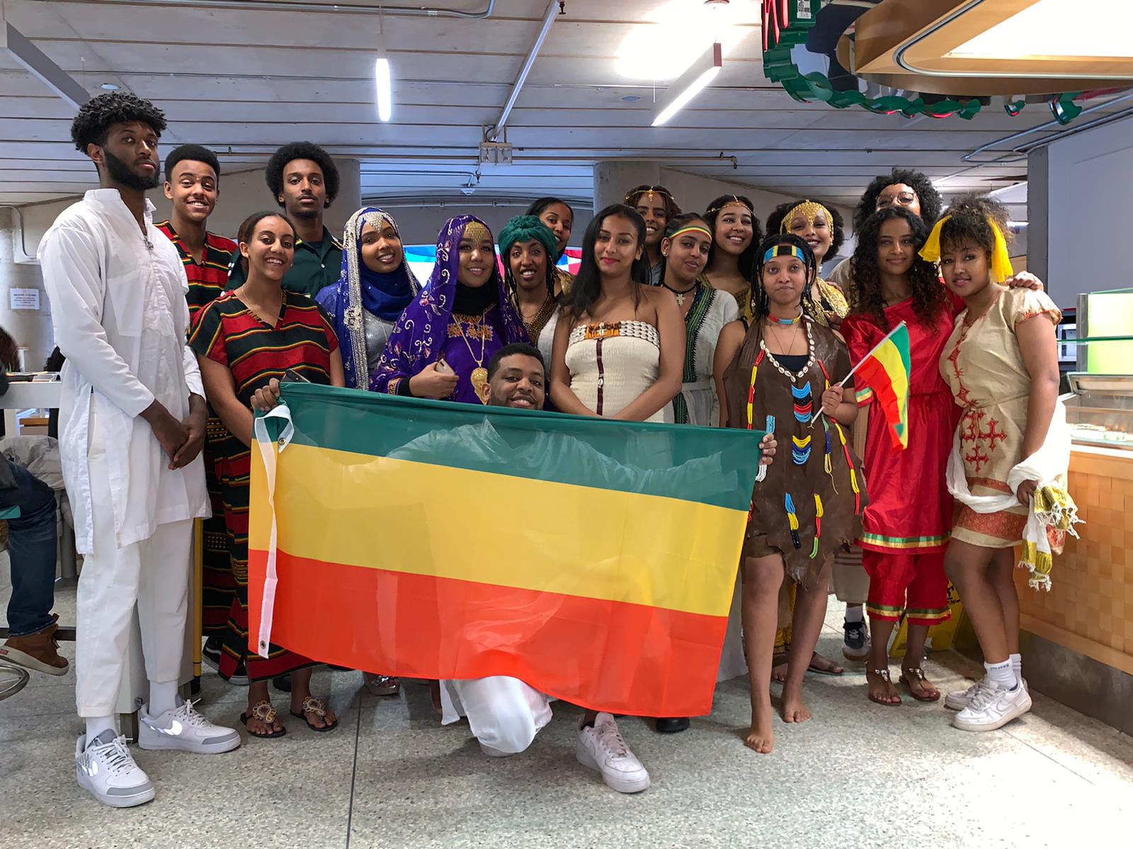A group of students dressed in different Ethiopian fashions